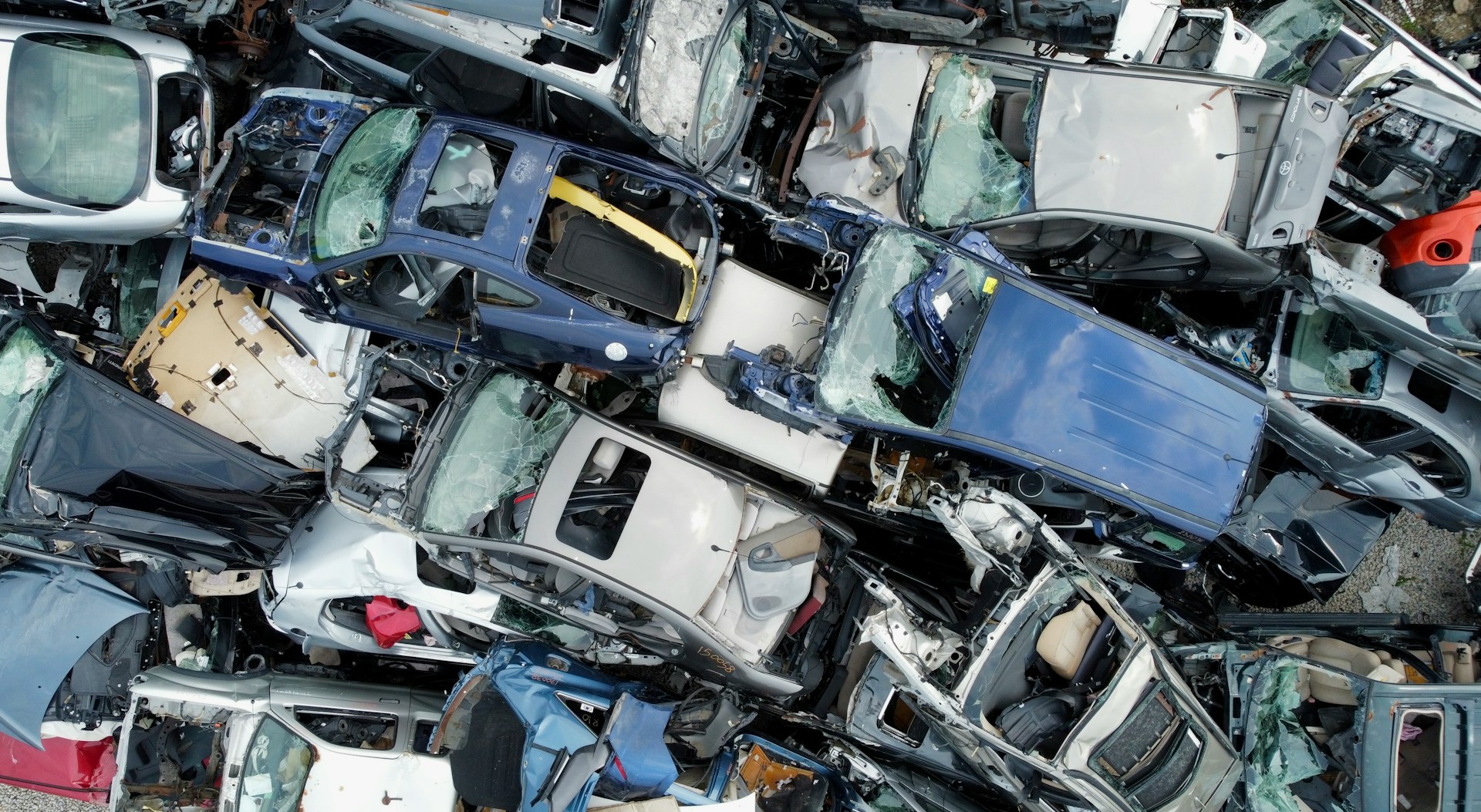 A pile of old junk cars.