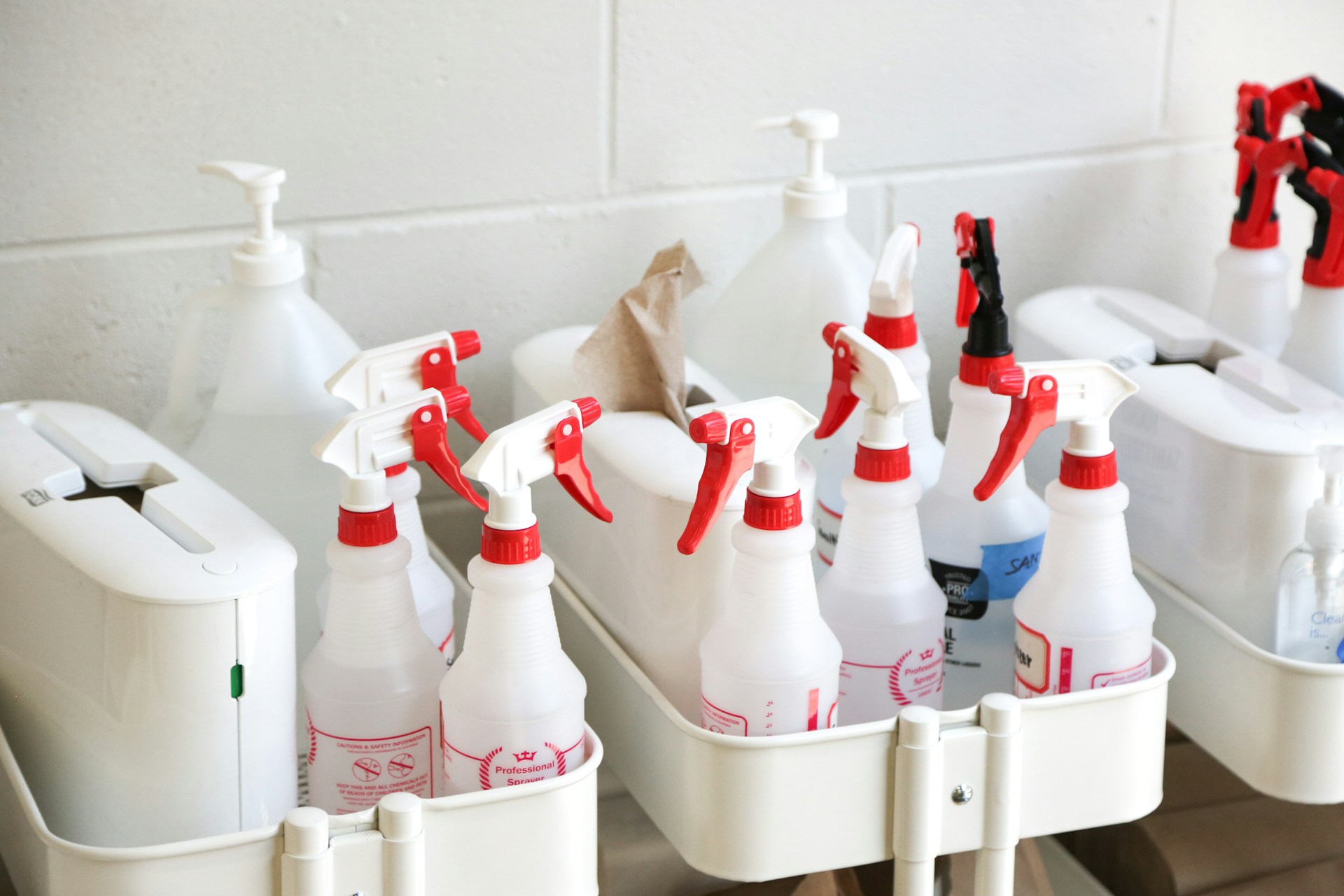 several spray bottles with clear solution