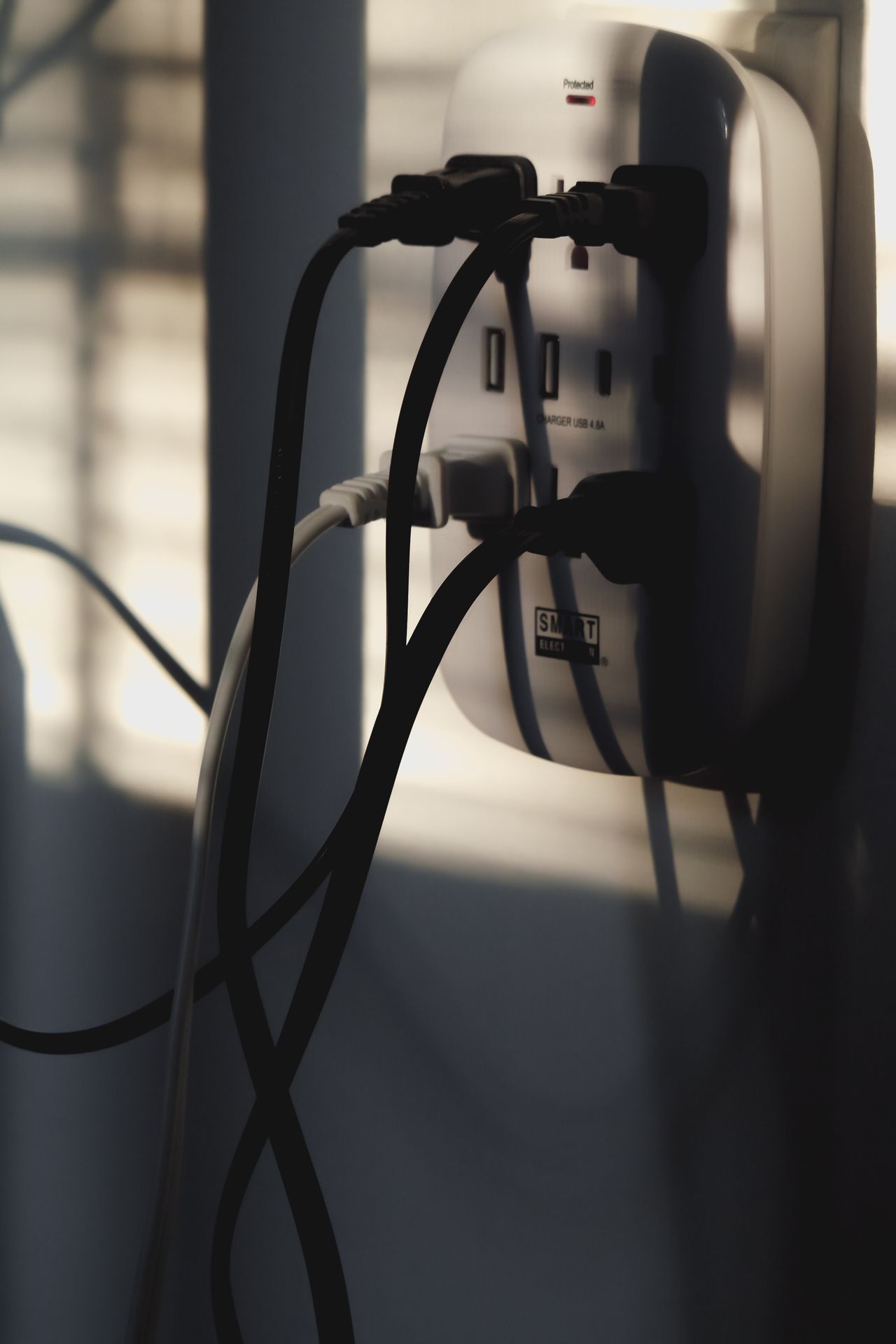 Electrical outlet with multiple plugs