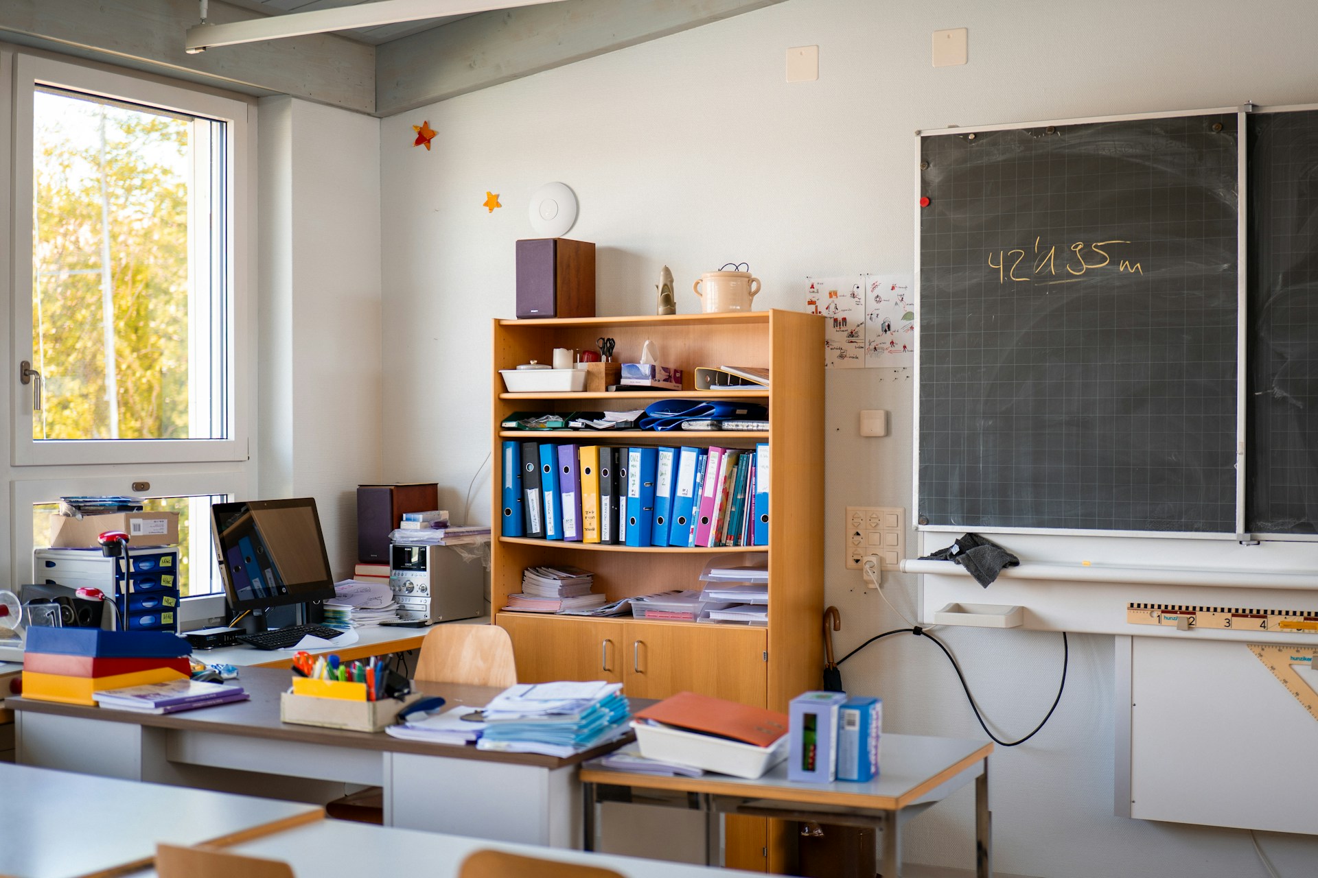 teacher's desk and chalkboard
